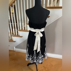 Black Dress with White Embroidery Design